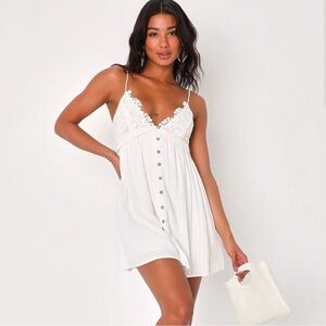 Lulu’s White embroidered button up tie back mini dress